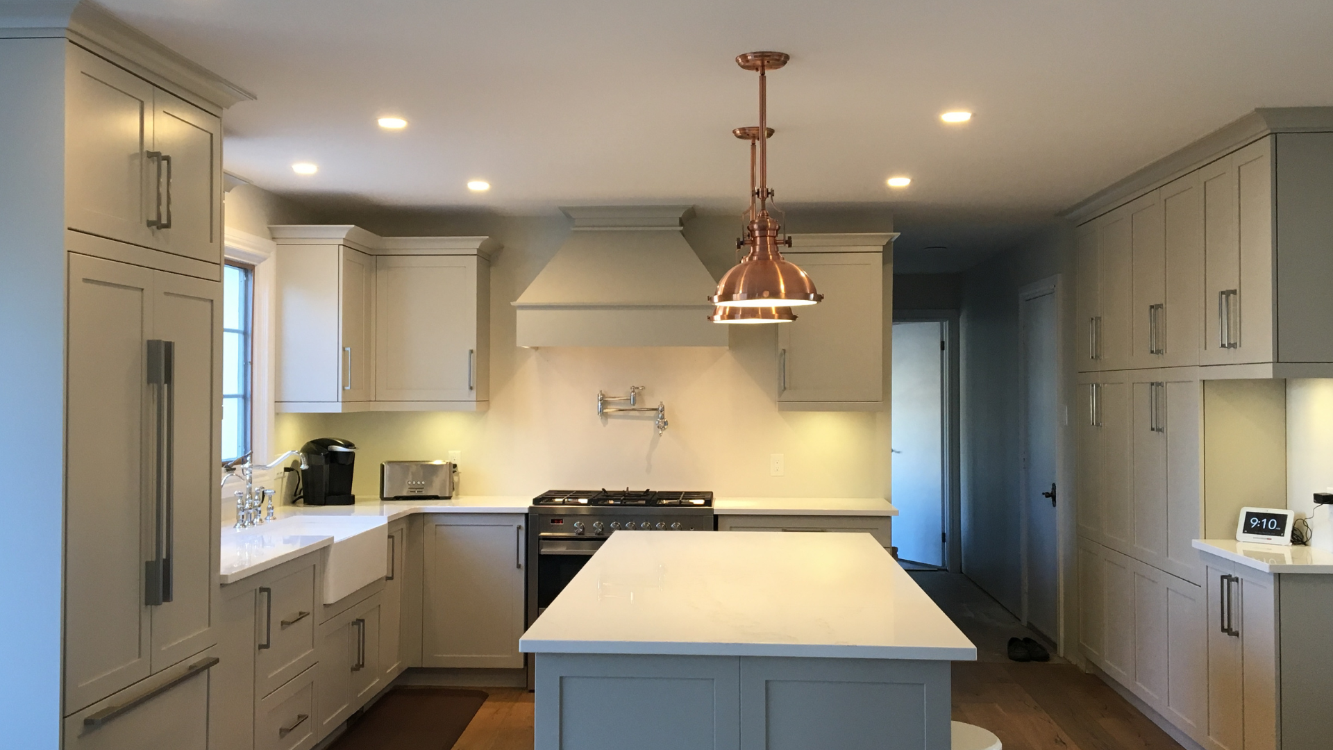 grey cabinets and quartz countertops in kitchen design